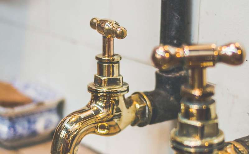 Fix Leaking Pipe in Kitchen